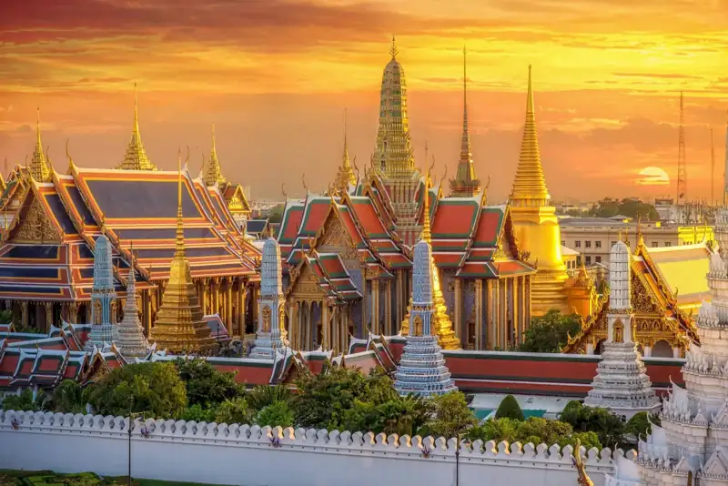 A large building with many spires on top of it