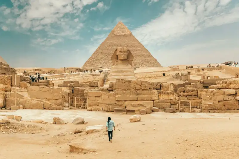Person walking near The Great Sphinx