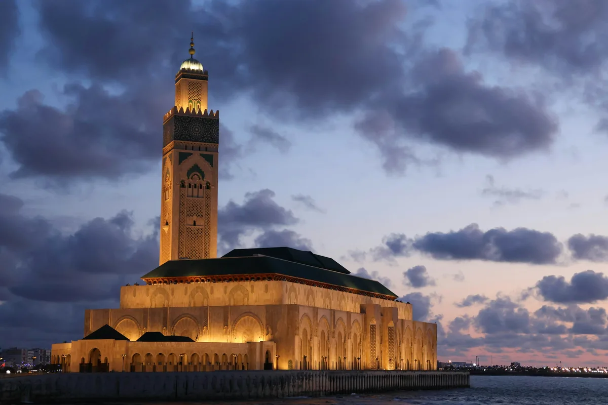 A tall tower with a clock on top of it
