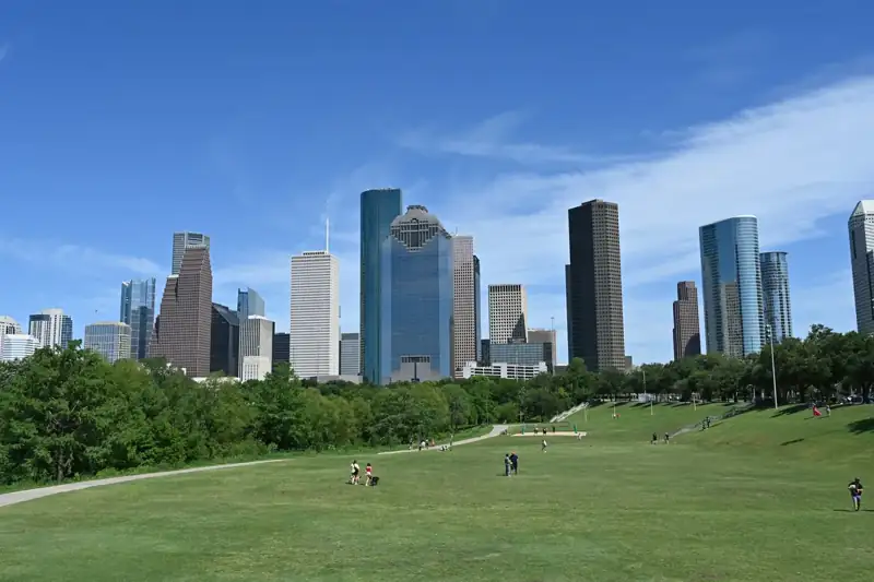 Houston, texas skyline is visible on a sunny day