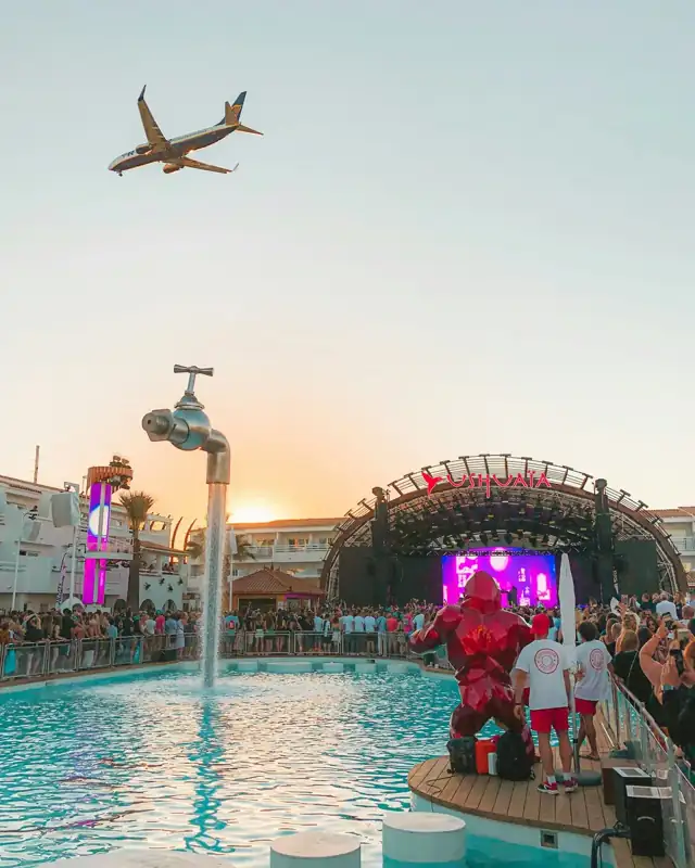 People standing beside pool