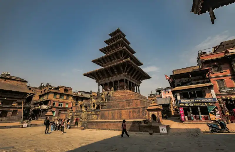 A very tall building sitting in the middle of a town