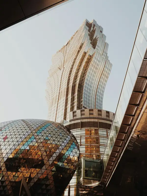 Brown high-rise building under the blue sky during daytime
