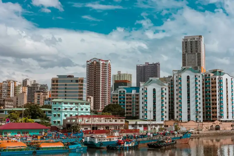 Cityscape photography of buildings and boats