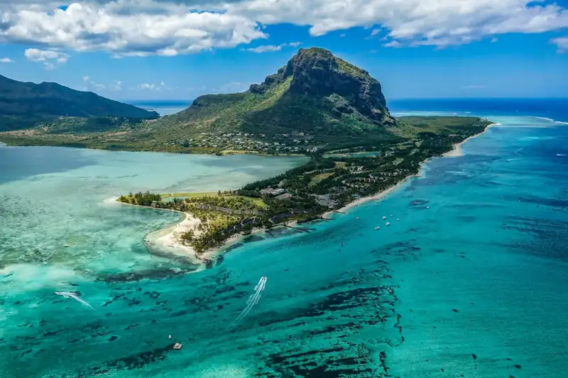 Aerial photography of island beside body of water