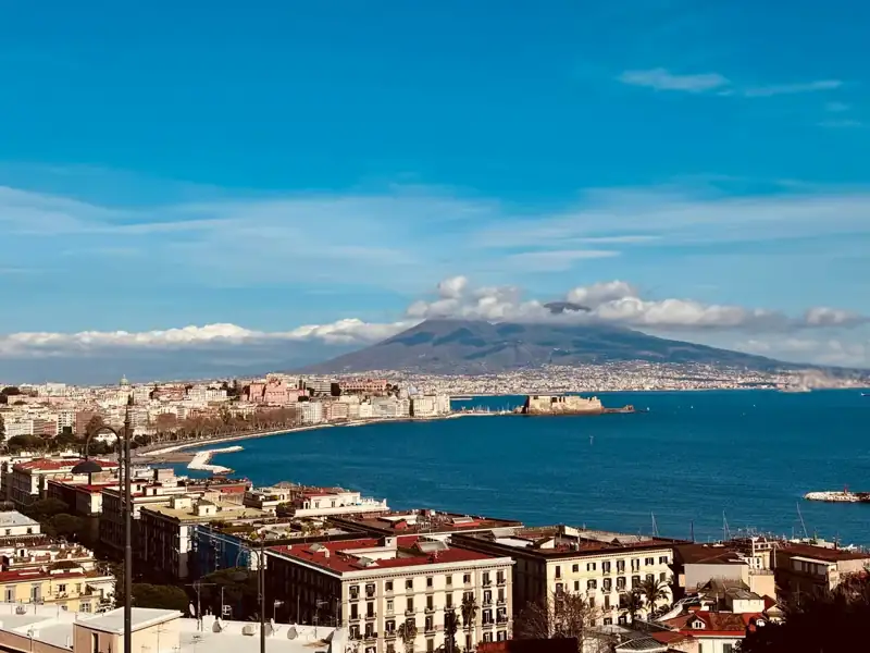 A large body of water surrounded by buildings
