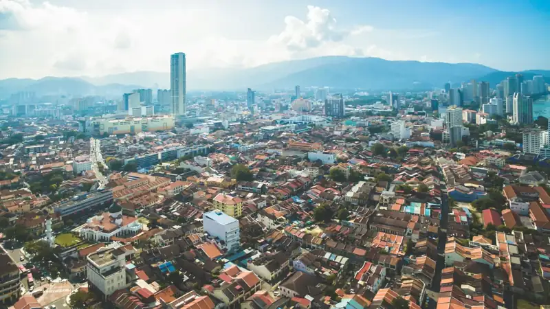 An aerial view of a city with tall buildings