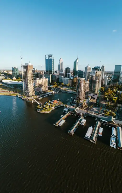 A large body of water surrounded by tall buildings