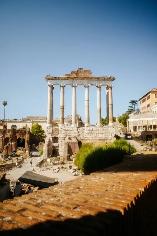 The Temple of Saturn with its iconic columns in the Roman Forum, Rome