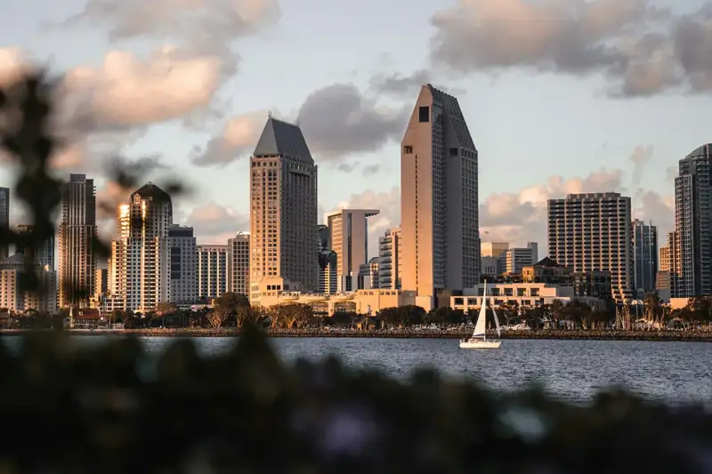 Photo of cityscape and body of water