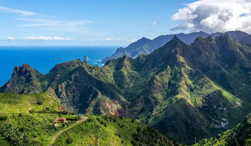 A scenic view of the mountains and ocean
