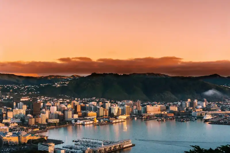 Aerial view of city buildings during sunset
